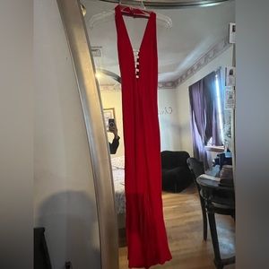 Red long rhinestoned dress.